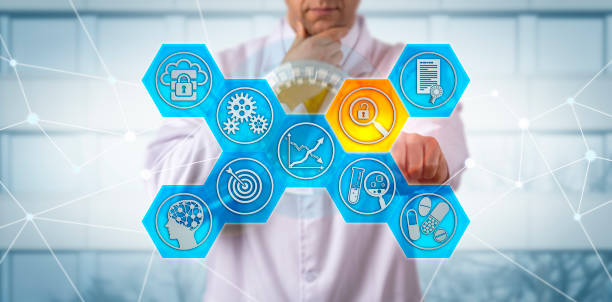 Unrecognizable clinician pondering a data integrity risk, while safeguarding drug quality. Pharma concept for laboratory automation, increased regulatory scrutiny, vulnerability, GMP compliance.